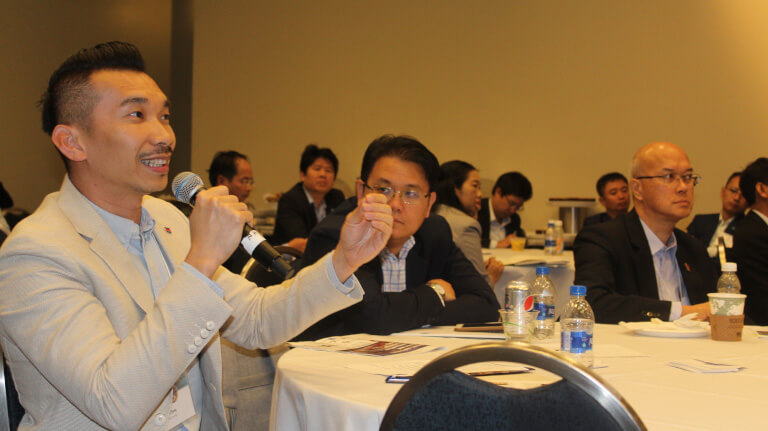 Male talking at the feedback session of the Smart Cities Symposium